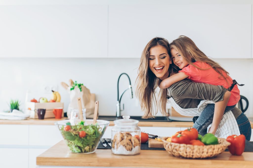 Mother and daughter in kitchen